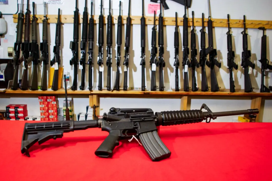 Justice Department Sues Denver Over Ban on AR-15 Rifles
