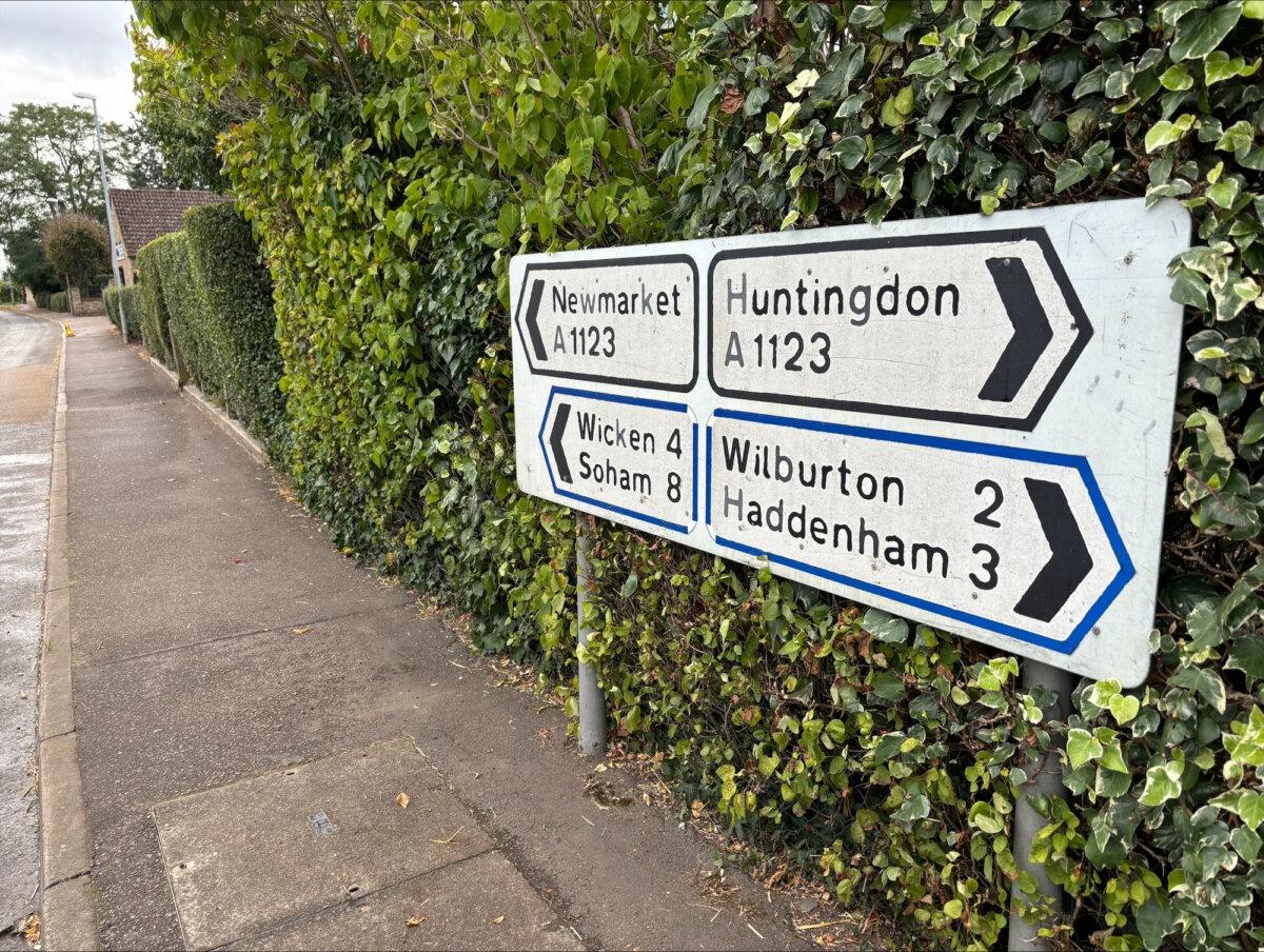 Road signs in the village of Stretham in Cambridgeshire, where Stephen Chamberlain was fatally struck by a car whilst out running, pictured on Aug. 20, 2024. (PA)