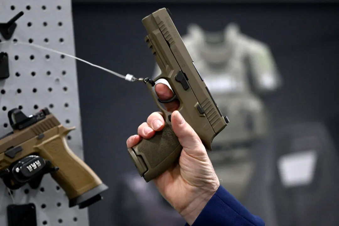 Injured Canadian Soldier Suing Federal Government, US Gunmaker Over Accidental Pistol Discharge