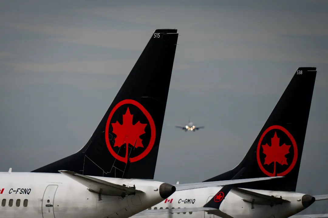 Air Canada Cuts Travel Agent Commissions in Bid to Lower Costs