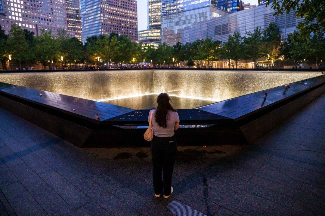 Day in Photos: Sept. 11 Anniversary, Pro-Independence March in Spain, and Painted Fields