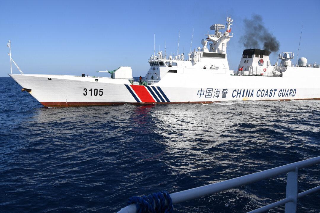 Chinese Coast Guard Fires Water Cannons at Philippine Ships in South China Sea