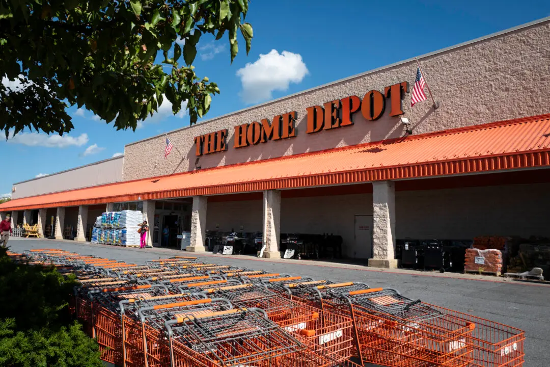 Home Depot Lowers Outlook as Mild Weather, Reduced Home Spending Hits Sales