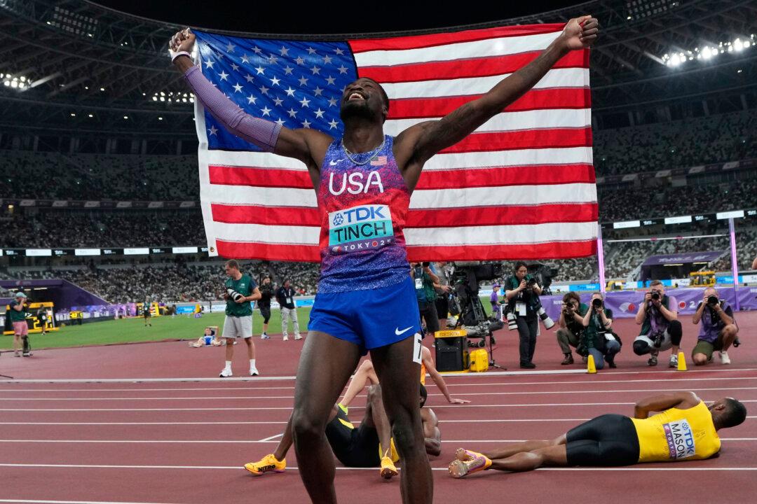 American Cordell Tinch Goes From the ‘Couch’ to Gold Medalist in the Track and Field Worlds