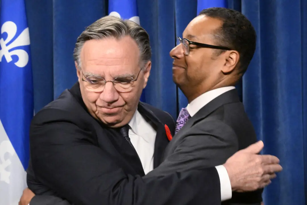 Quebec Minister Resigns Amid Furor Over Doctor Payment Bill