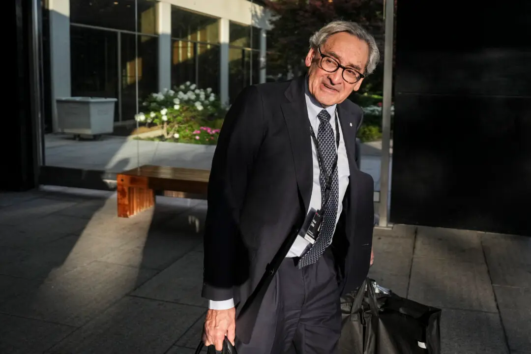 Head of Public Service Says Programs, Staff Will Be Cut as Government Seeks Savings