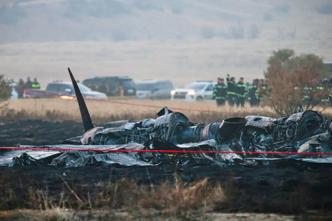 Day in Photos: Turkish Plane Crash, 70th Anniversary of Bundeswehr, and Southern Lights