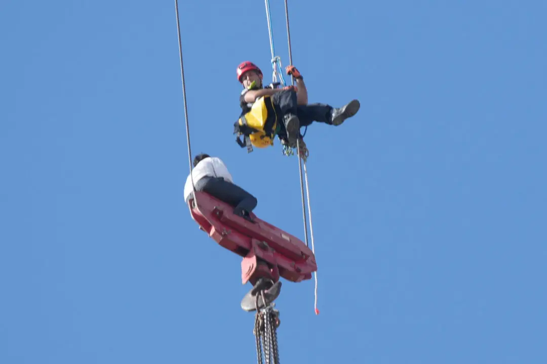 Fire Teams Rescue 15-Year-Old Stuck on Crane Over High-Rise Building in Jerusalem