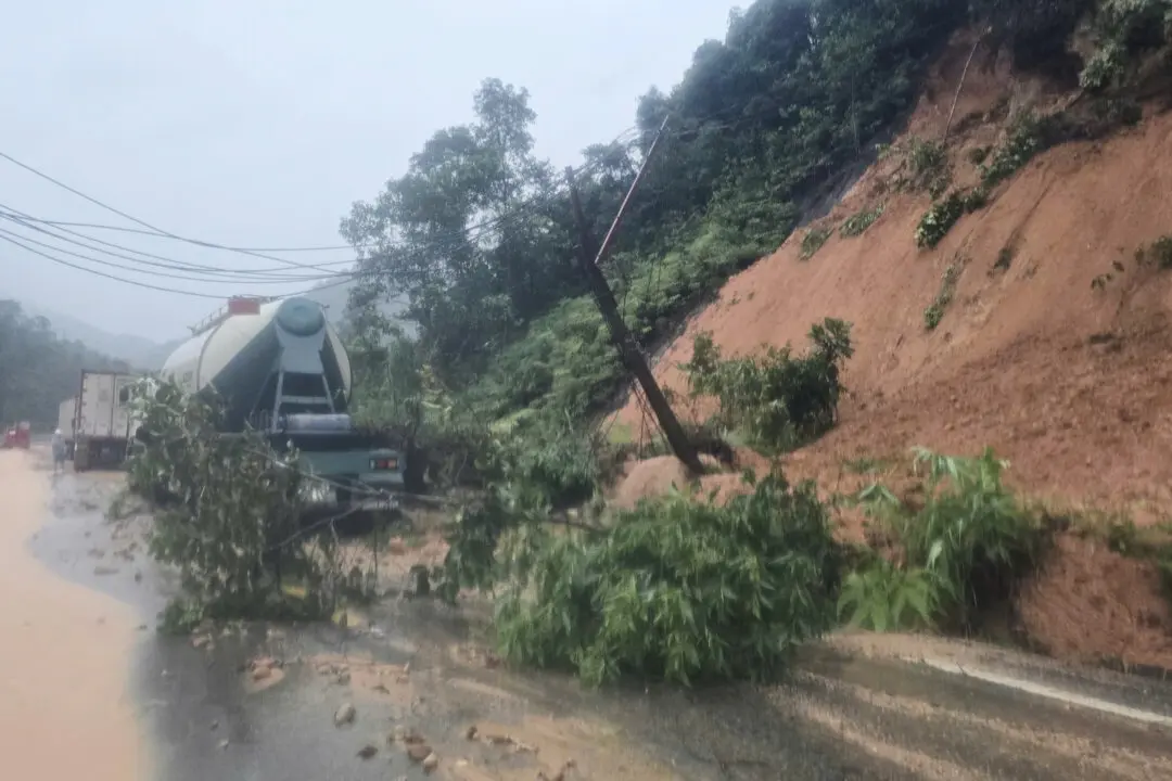 Heavy Rain Triggers Landslides and Floods in Central Vietnam, Killing 7
