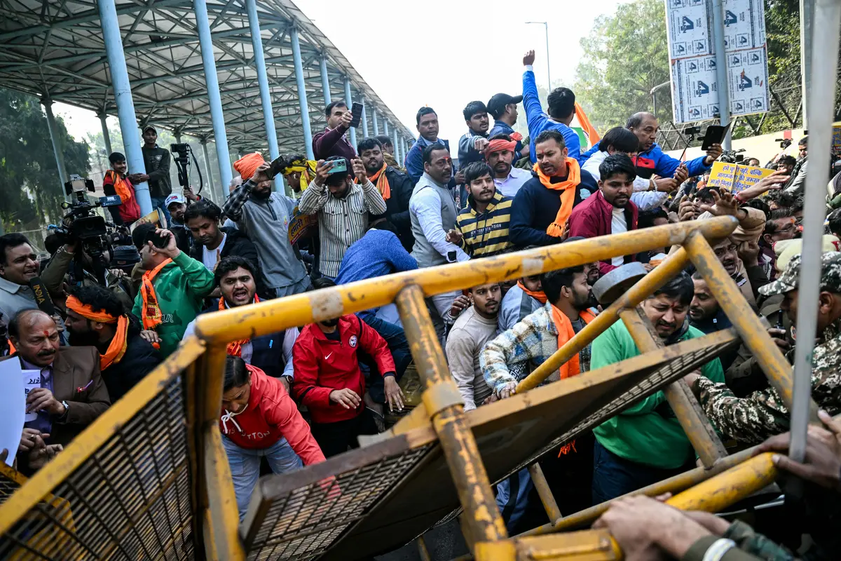 Day in Photos: Protests in India, House Explosion in Paris, and Christmas Ballet in Kenya thumbnail