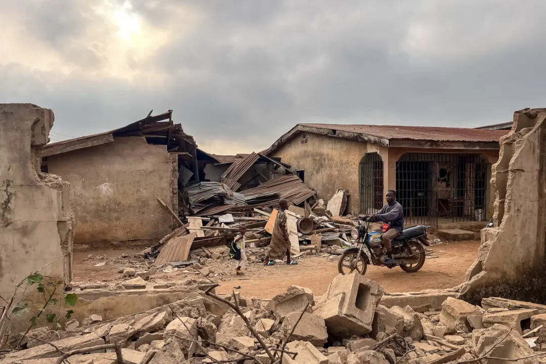 Day in Photos: Strikes Against ISIS in Nigeria, Flooding in France, and Classic Car Exhibition