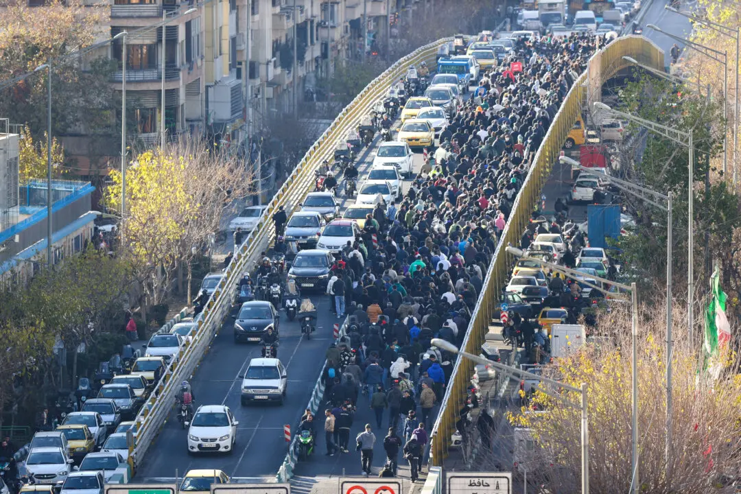 Protests Flare Across Iran as Currency Plummets