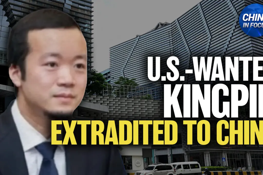 China Holds US-Wanted Scam Kingpin