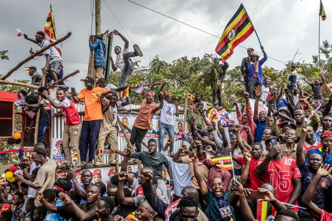 Day in Photos: Elections in Uganda, Nurses Protest in New York, and ‘Coming of Age Day’ in Japan