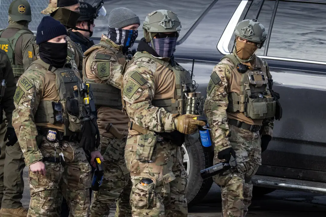 Minnesota, Illinois Sue Trump Admin Over ICE Deployments