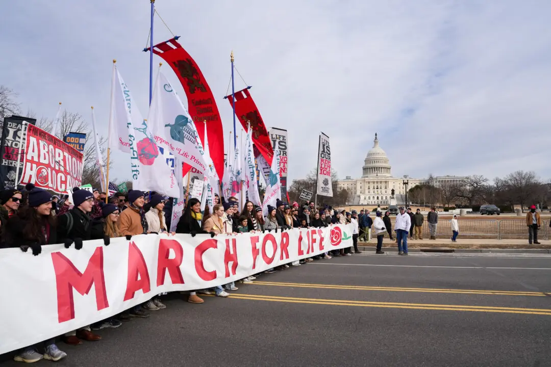 Day in Photos: March for Life in Washington, No-Confidence Motion in France, and Danish Prime Minister Visits Greenland