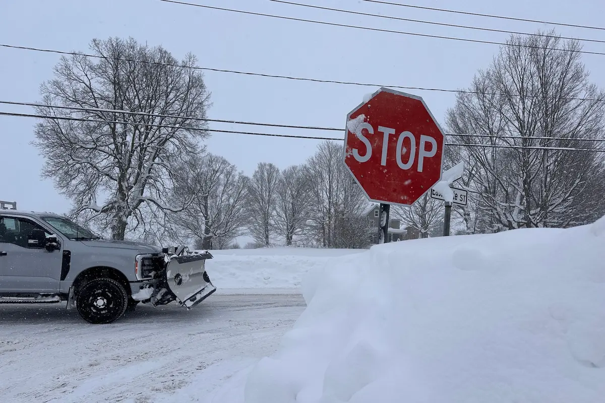 Winter Storm Snarls Travel, Threatens Power Outages as Ice and Snow Sweep US