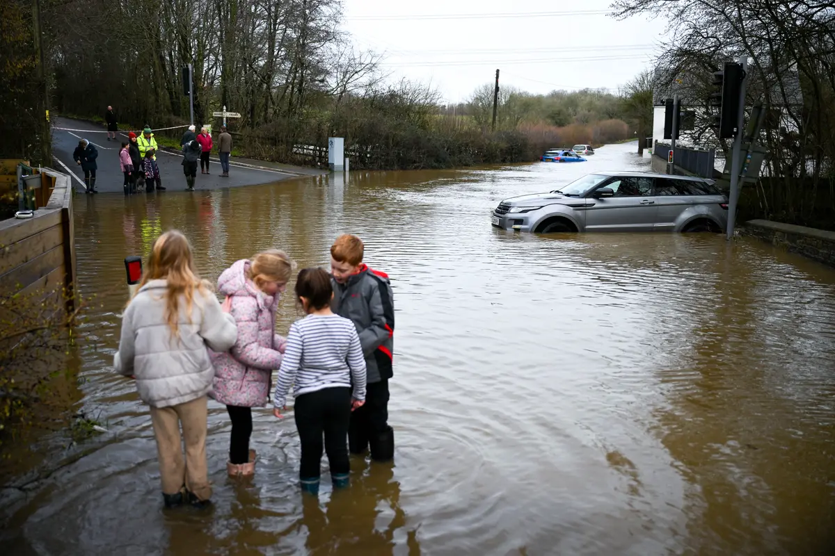 Day in Photos: Flood in England, Tsunami Museum, and Ice in the Hudson River