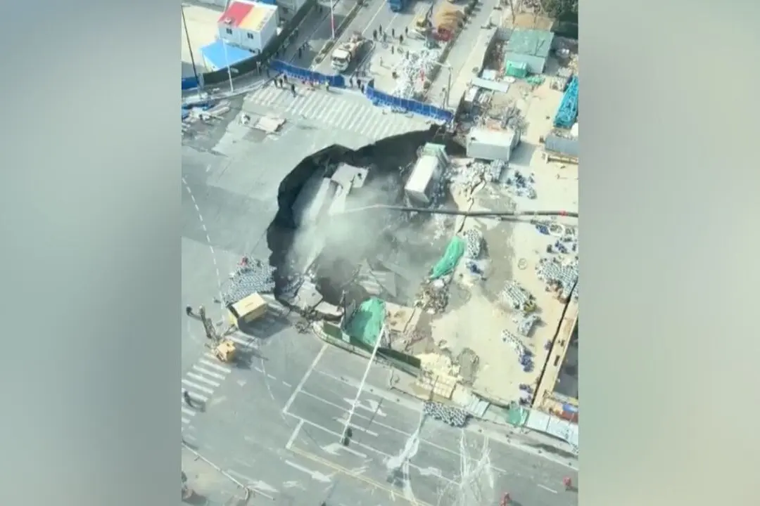 Massive Sinkhole Opens Up on Street in China