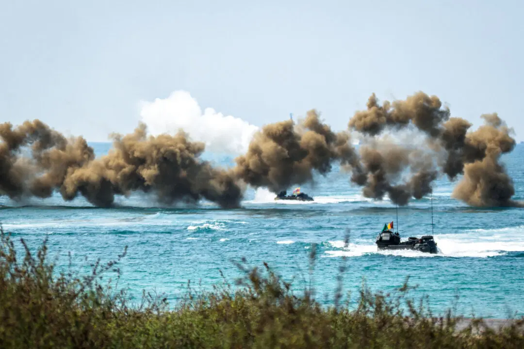 Day in Photos: Amphibious Drill in Thailand, Protests in Greece, and Festival of Colours