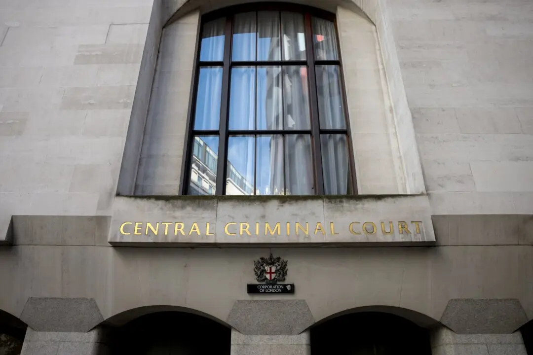 2 Men on Trial on Charges They Spied on Hong Kong Diaspora in the UK