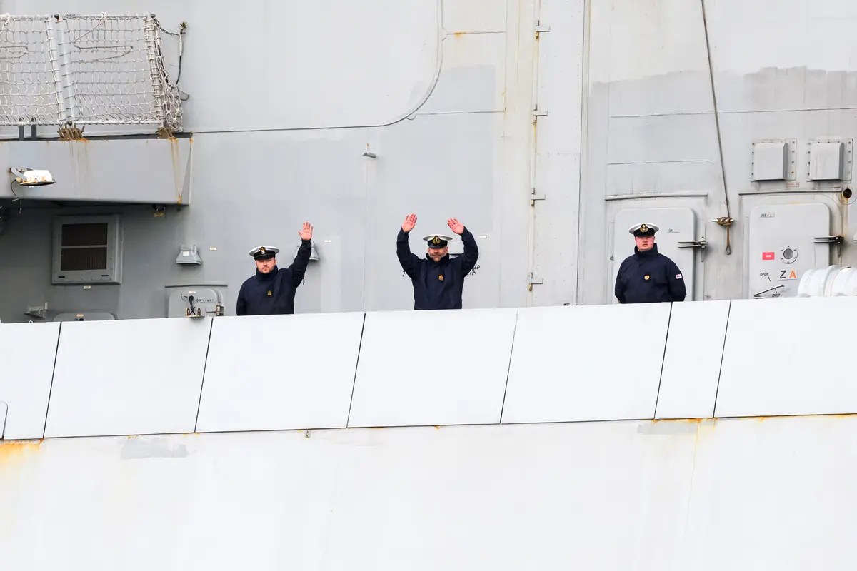Day in Photos: British Destroyer Heads to Cyprus, Barge Fire in Delaware, and Removing German Sea Mines