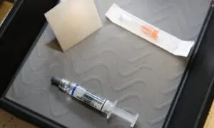 Woman Whose Children Died After Vaccinations Charged With Murder