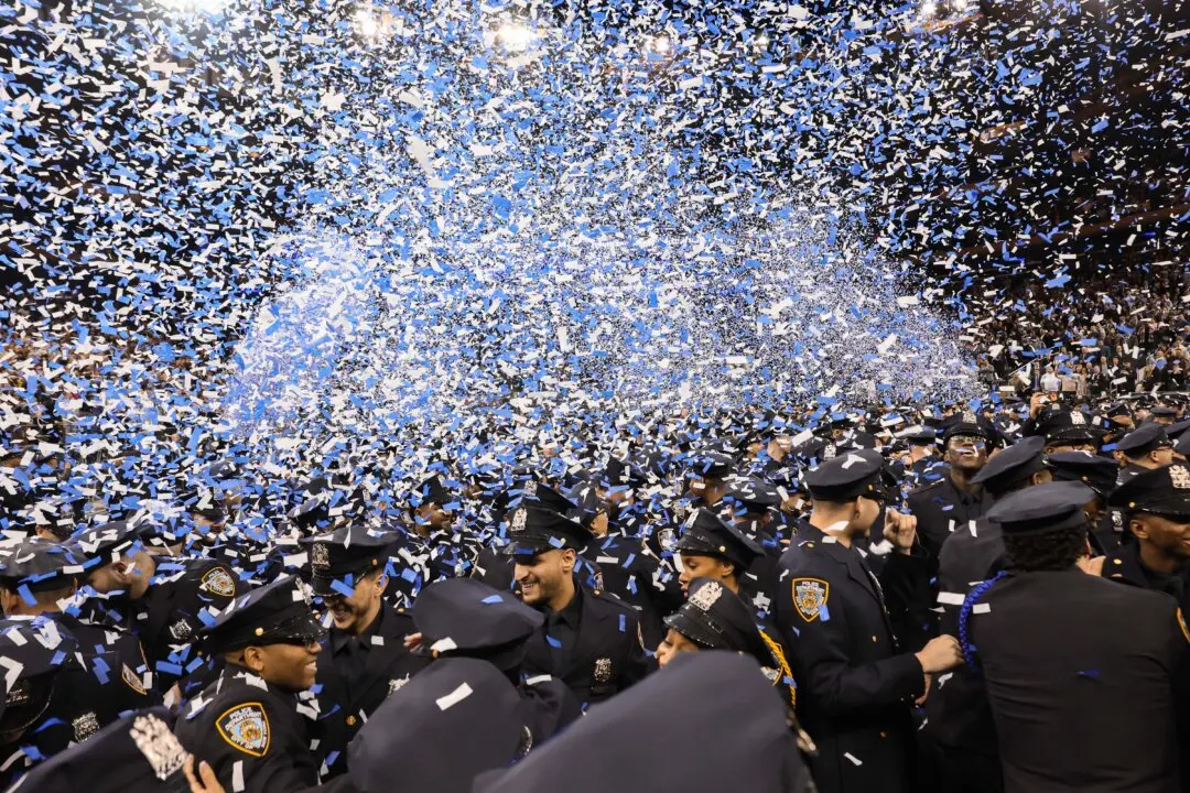 NYPD graduates celebrate during their Recruit Graduation Ceremony at Madison Square Garden in New York City on March 9, 2026. (Michael M. Santiago/Getty Images)