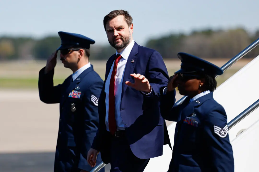 Vice President JD Vance waves as he departs Air Force Two at Rocky Mount-Wilson Regional Airport in Elm City, N.C., on March 13, 2026. Vance is traveling to North Carolina to deliver remarks on the Trump administration's economic agenda. (Kent Nishimura/Getty Images)