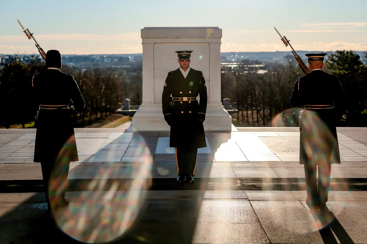 America in Photos: Tomb of the Unknown Soldier, ‘Killed to Order’ Book Launch, and 100K Ultramarathon