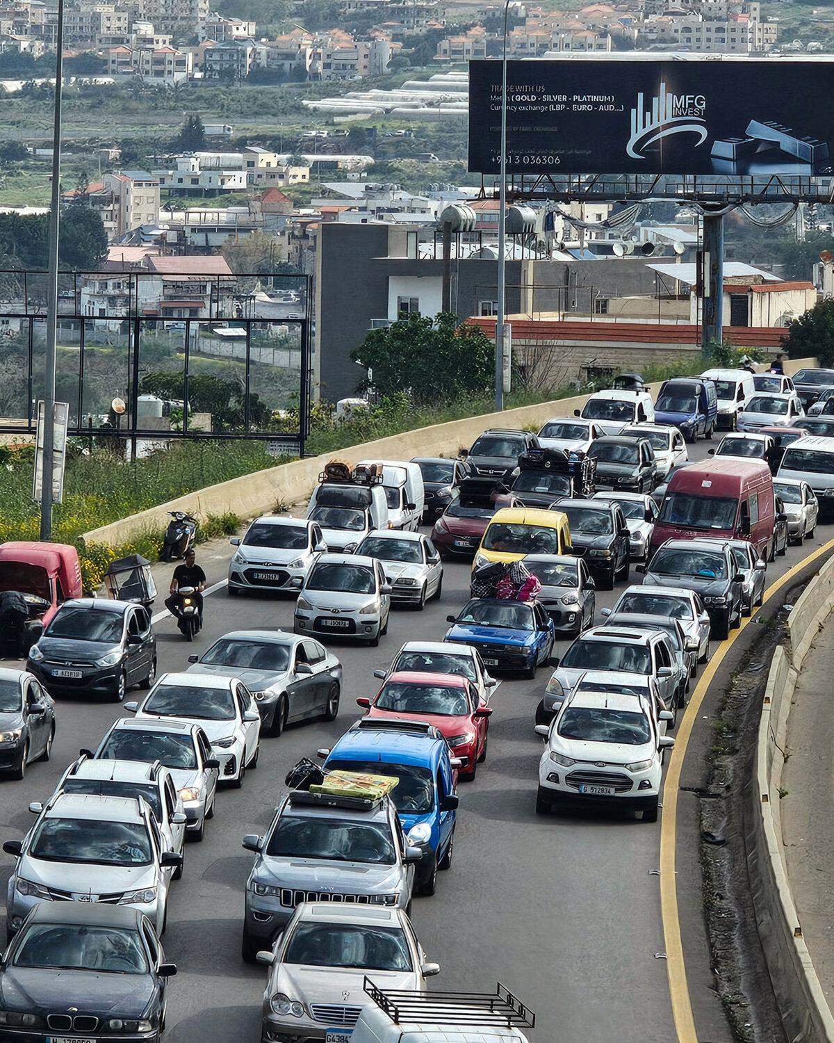 Displaced residents drive along a highway on their way home in Rmeileh, near Sidon, Lebanon, on April 17, 2026. (AFP via Getty Images)