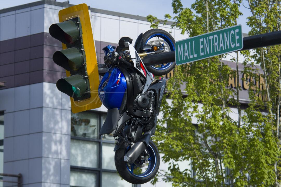 Crash in Delta, BC, Leaves Motorcycle Hanging From Traffic Light