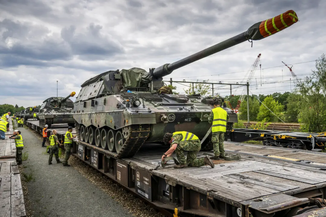 Day in Photos: Fighter Lion Tanks, Factory Explosion in Malta, and Children’s Safety Debate