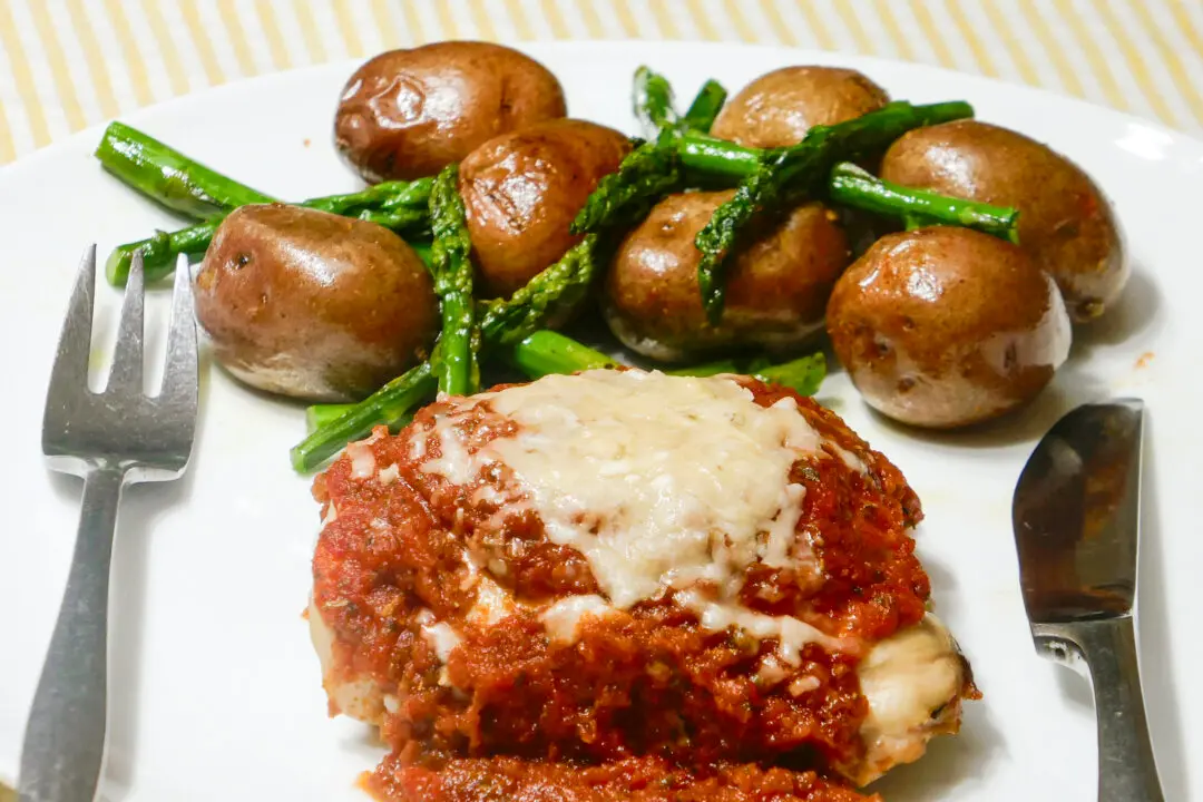 Savory Oven-Baked Chicken Thighs With Roasted Potatoes and Asparagus
