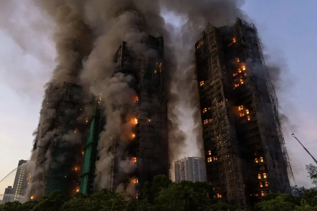 7 People, 2 Companies Charged Over Hong Kong Fire That Killed 168 People