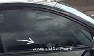 Ottawa Motorist Nabbed for Using Laptop and Cellphone on Freeway