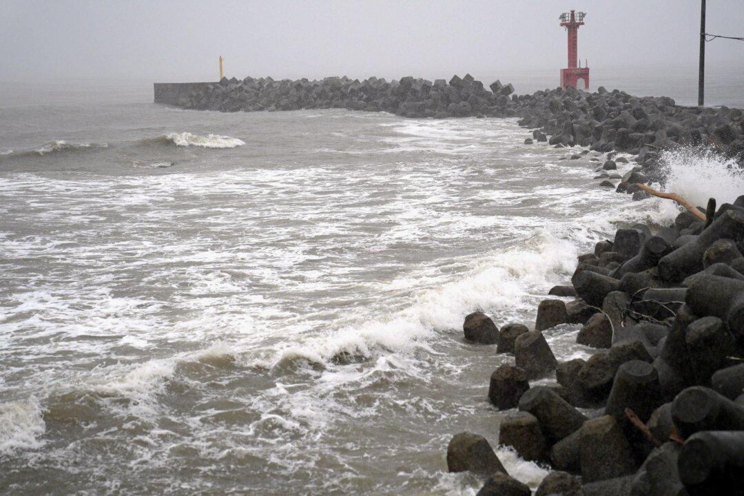 2 Tropical Storms Pound Japan With Floods and Landslides, Killing 1