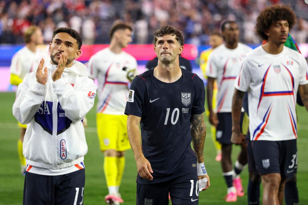 Pulisic Calm, US Coach Feisty After Loss in Meaningless Group D Finale