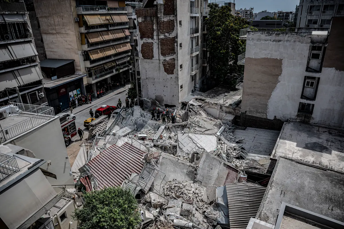 Day in Photos: Building Collapse in Greece, Flooding in Nigeria, and Royal Navy Exercises