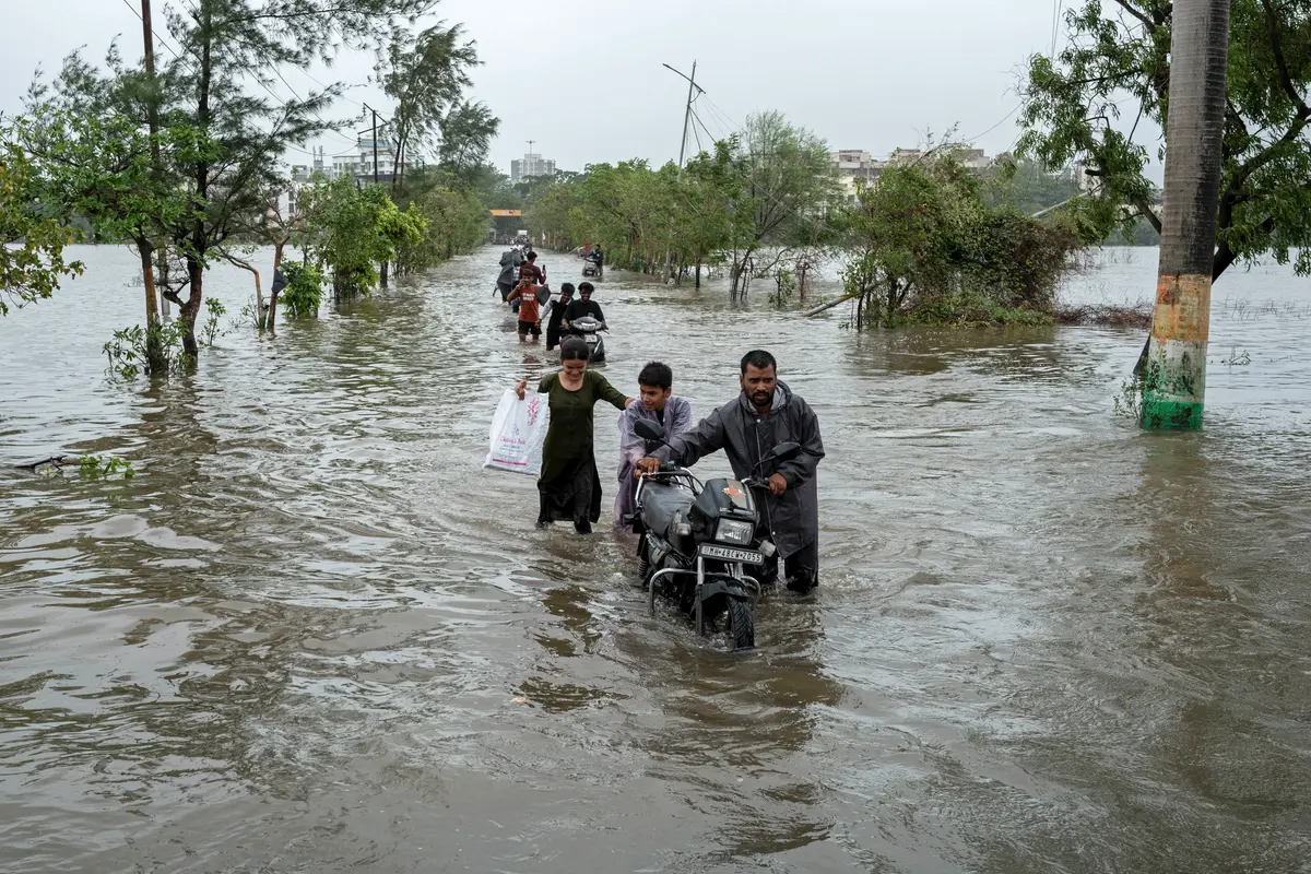 Day in Photos: Heavy Flooding in India, Running of the Bulls, and Underground Aquatic Study