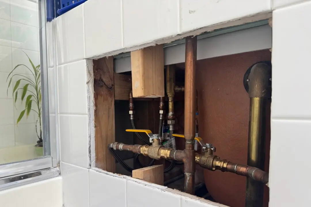 A Clever Plumbing Access Panel Solution