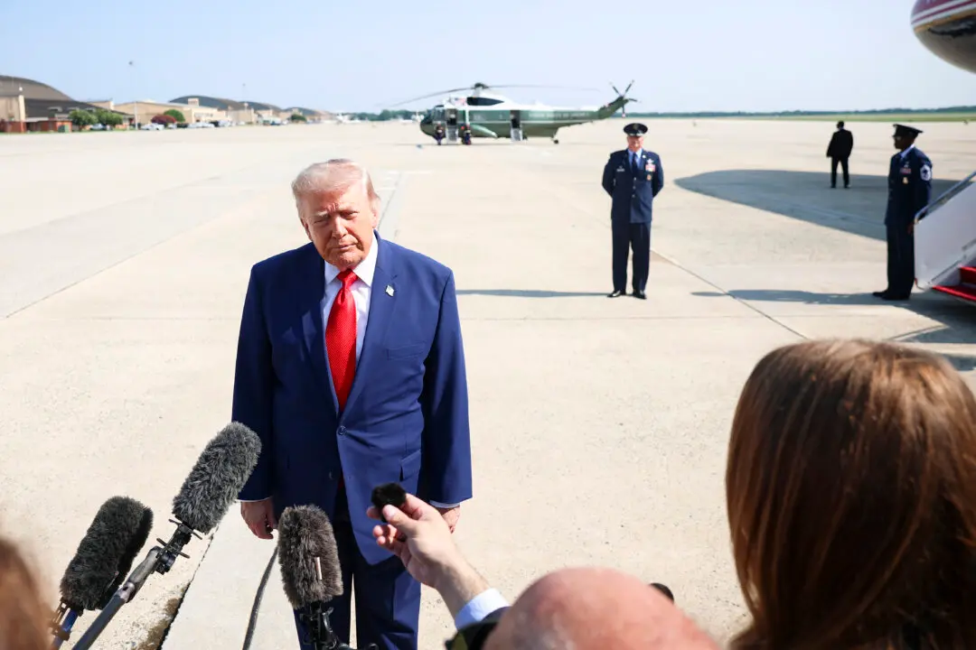 Trump Speaks to Reporters Aboard Air Force One En Route to Michigan