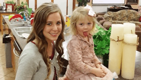 Jana Duggar with a younger sister in a 2013 file photo. (Duggar Family)