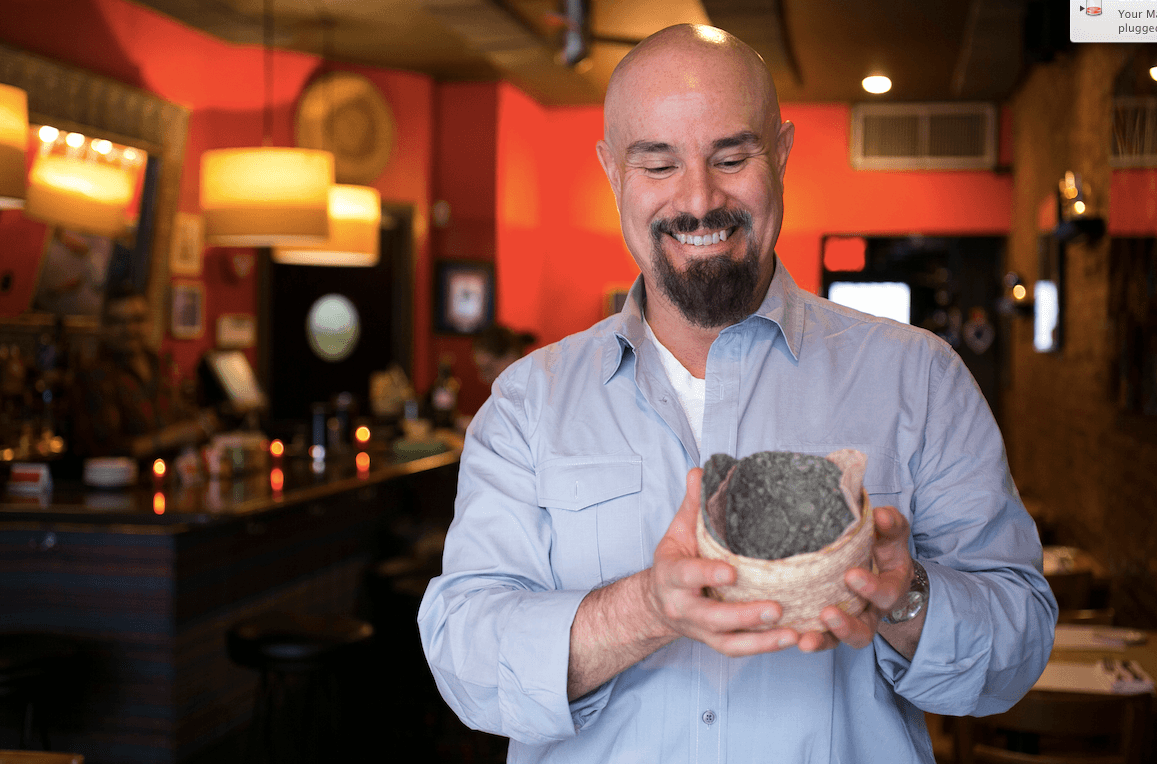Renowned chef Roberto Santibañez holds up a basket of his heirloom corn tortillas. (Samira Bouaou/Epoch Times)