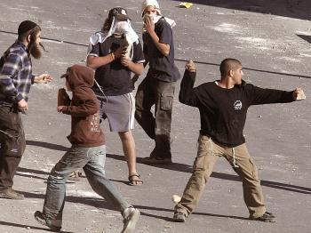 <a href="https://www.theepochtimes.com/assets/uploads/2015/07/4hebron83881045_medium.jpg"><img src="https://www.theepochtimes.com/assets/uploads/2015/07/4hebron83881045_medium.jpg" alt="An Israeli settler prepares to throw a stone during riots near a disputed house in the West Bank city of Hebron.  (Hazem Bader/AFP/Getty Images)" title="An Israeli settler prepares to throw a stone during riots near a disputed house in the West Bank city of Hebron.  (Hazem Bader/AFP/Getty Images)" width="320" class="size-medium wp-image-77264"/></a>