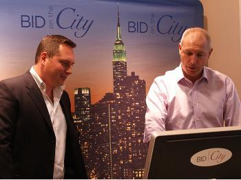 <a href="https://www.theepochtimes.com/assets/uploads/2015/07/BidonCity_medium.jpg"><img src="https://www.theepochtimes.com/assets/uploads/2015/07/BidonCity_medium.jpg" alt="CHECKING THE SITE: Co-founder Vlad Sapozhnikov (L) and managing director Raymond Villani check the Bid on the City Web site in their office on 5th Ave., Manhattan. (Charlotte Cuthbertson/The Epoch Times)" title="CHECKING THE SITE: Co-founder Vlad Sapozhnikov (L) and managing director Raymond Villani check the Bid on the City Web site in their office on 5th Ave., Manhattan. (Charlotte Cuthbertson/The Epoch Times)" width="320" class="size-medium wp-image-95445"/></a>