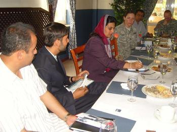 <a href="https://www.theepochtimes.com/assets/uploads/2015/07/MeetingKabul_medium.jpg"><img src="https://www.theepochtimes.com/assets/uploads/2015/07/MeetingKabul_medium.jpg" alt="INFORMED: Farida Nekzad, an Afghan journalist based in Kabul, in a meeting at the International Security Assistance Force headquarters. (Courtesy of IWMF)" title="INFORMED: Farida Nekzad, an Afghan journalist based in Kabul, in a meeting at the International Security Assistance Force headquarters. (Courtesy of IWMF)" width="320" class="size-medium wp-image-86203"/></a>