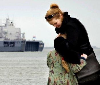 <a href="https://www.theepochtimes.com/assets/uploads/2015/07/PHOTO3-98255878-WEB_medium.jpg"><img src="https://www.theepochtimes.com/assets/uploads/2015/07/PHOTO3-98255878-WEB_medium.jpg" alt="UNCERTAINTY: A young girl is comforted by her mother as the Dutch marine vessel Hr.Ms. Johan de Witt where her father is serving, leaves from the harbor of Den Helder on April 5. The ship has been sent to patrol as part of the E.U. counterpiracy mission off the coast of Somalia. (Robin Van Longkhuijsen/Getty Images )" title="UNCERTAINTY: A young girl is comforted by her mother as the Dutch marine vessel Hr.Ms. Johan de Witt where her father is serving, leaves from the harbor of Den Helder on April 5. The ship has been sent to patrol as part of the E.U. counterpiracy mission off the coast of Somalia. (Robin Van Longkhuijsen/Getty Images )" width="320" class="size-medium wp-image-112830"/></a>