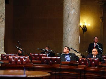 <a href="https://www.theepochtimes.com/assets/uploads/2015/07/SNate109347580Web_medium.jpg"><img src="https://www.theepochtimes.com/assets/uploads/2015/07/SNate109347580Web_medium.jpg" alt="Republican lawmakers meet in the half-empty Wisconsin State Capitol Senate chambers February 22, 2011. (Eric Thayer/Getty Images)" title="Republican lawmakers meet in the half-empty Wisconsin State Capitol Senate chambers February 22, 2011. (Eric Thayer/Getty Images)" width="320" class="size-medium wp-image-121695"/></a>