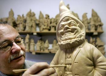 <a href="https://www.theepochtimes.com/assets/uploads/2015/07/gnome56599618_medium.jpg"><img src="https://www.theepochtimes.com/assets/uploads/2015/07/gnome56599618_medium.jpg" alt="An artist carves a gnome ornament in his German workshop. Though the gnome has become a garden cliché, it originates in tales of little people which are popular throughout the world. (Ens-Ulrich Koch/AFP/Getty Images)" title="An artist carves a gnome ornament in his German workshop. Though the gnome has become a garden cliché, it originates in tales of little people which are popular throughout the world. (Ens-Ulrich Koch/AFP/Getty Images)" width="300" class="size-medium wp-image-64676"/></a>